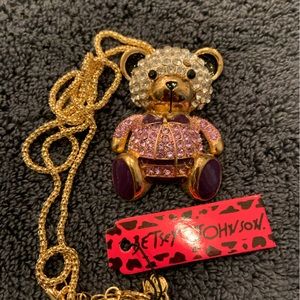 BJ boy teddy bear with lavender and purple rhinestones. Drop is 12”.